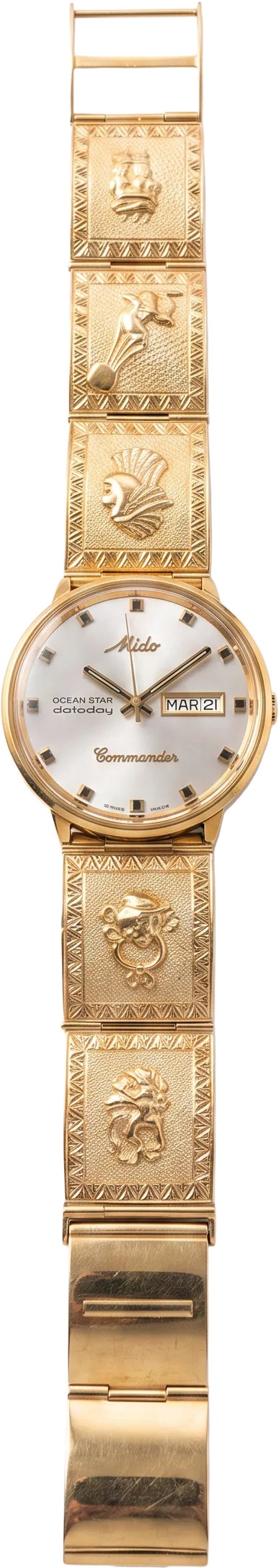 Mido Commander con la manilla de oro 18k tallada a mano
