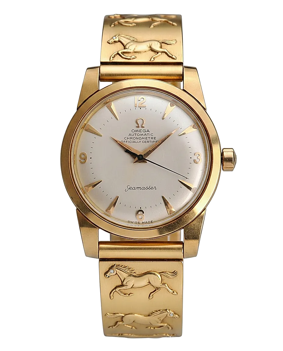 Omega Seamaster con brazalete de oro 18k con caballos en relieve