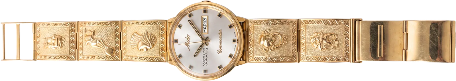 Mido Commander de frente con manilla de oro 18k precolombina